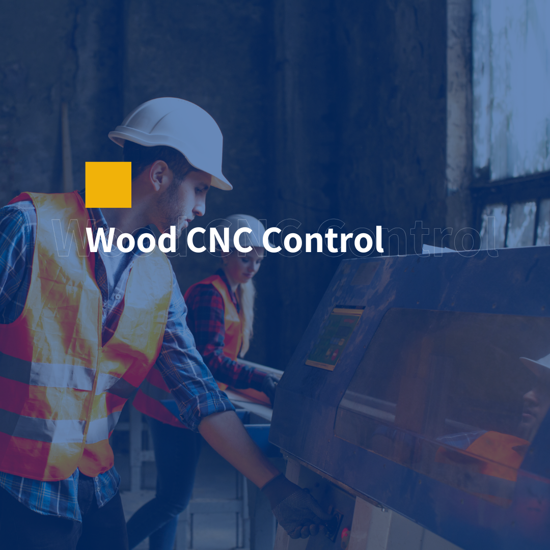 Operator using a CNC machine for wood processing
